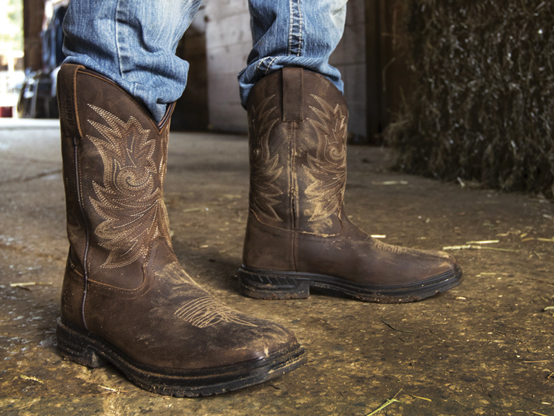 man wearing rocky mens western cowboy work boots
